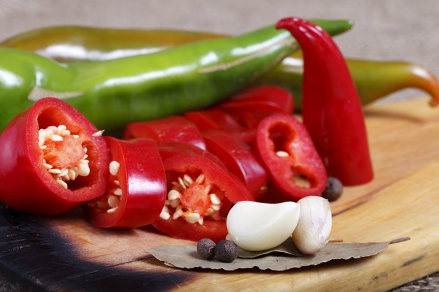 hot peppers , beautiful background spices and condiments close up