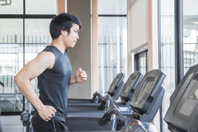 man at the gym doing exercise on treadmill