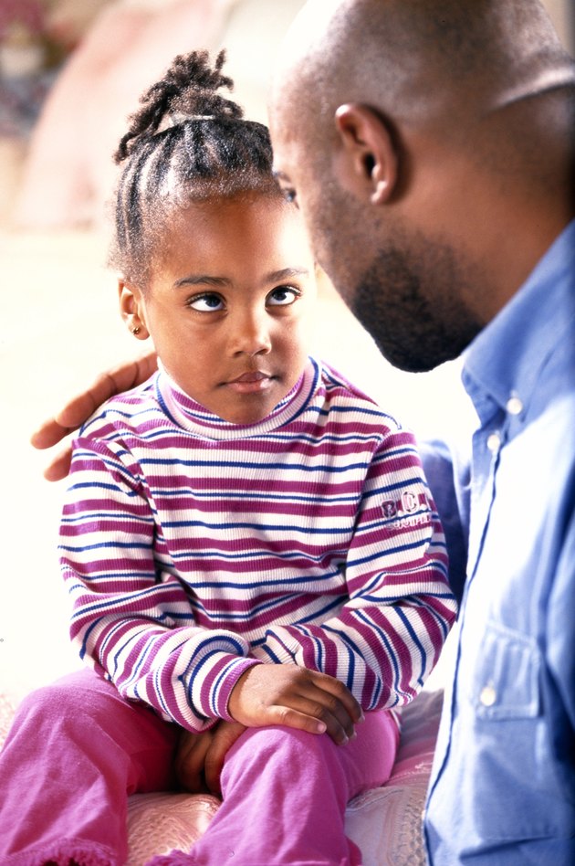 Father talking to daughter