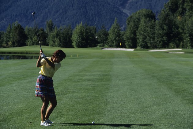 Female golfer ready to swing, Sun Valley, Idaho, USA