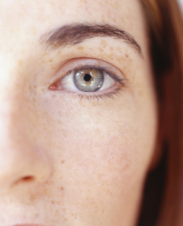 Woman looking at camera, (Close-up)