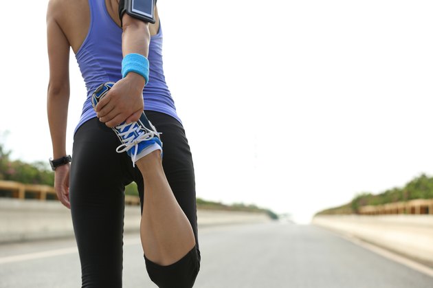 young woman runner warm up outdoor