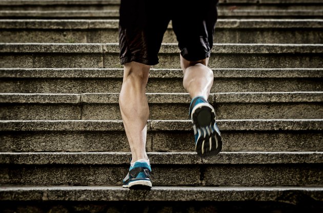 athletic sport runner man running up stairs in urban training