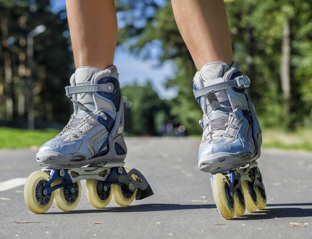 Close-up view of female legs in roller blades