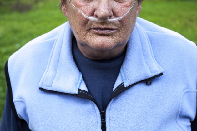 Senior woman with Chronic obstructive pulmonary disease with supplemental oxygen