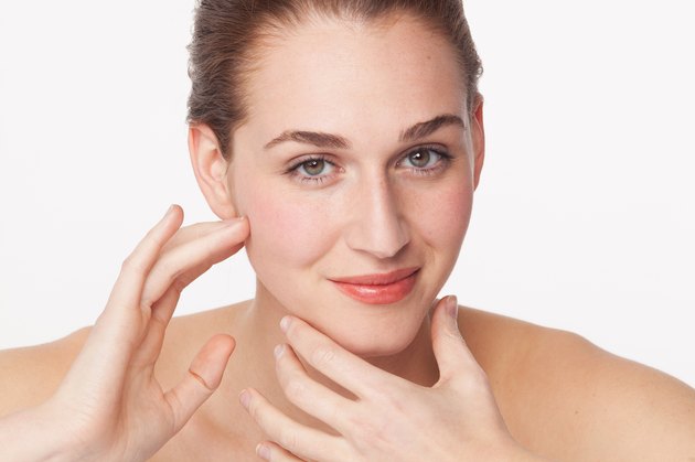 concept of female beauty, natural freshness and modeling face