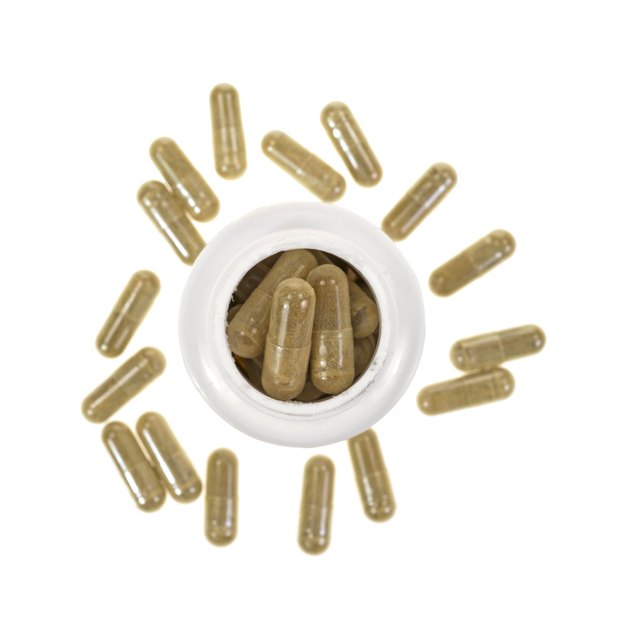 Green tea extract capsules with container