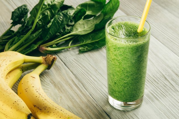 Green Smoothies of spinach and banana in a glass