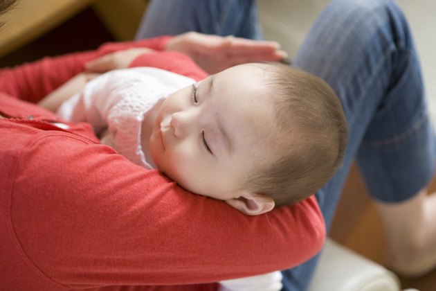 Mother Holding Baby Girl