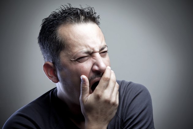 Tired Man Yawning