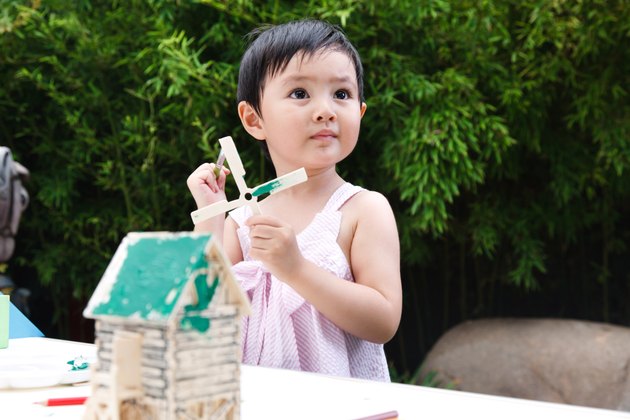 Little girl painting