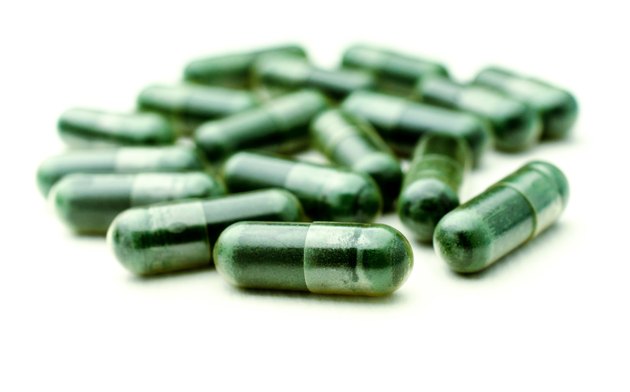 Medical pills on white background
