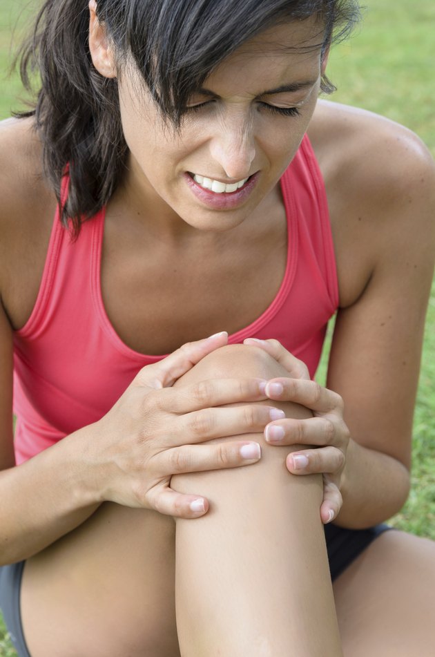 Woman suffering pain knee
