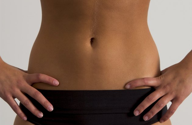 Woman's waist and hands on her hips