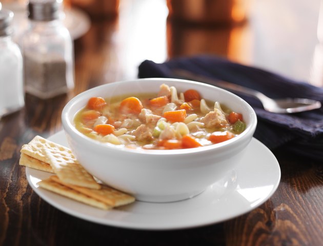 chicken noodle soup on wooden table