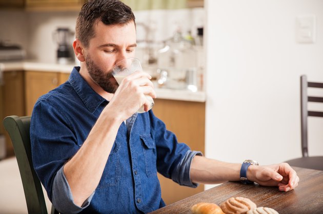 Enjoying a glass of milk at home