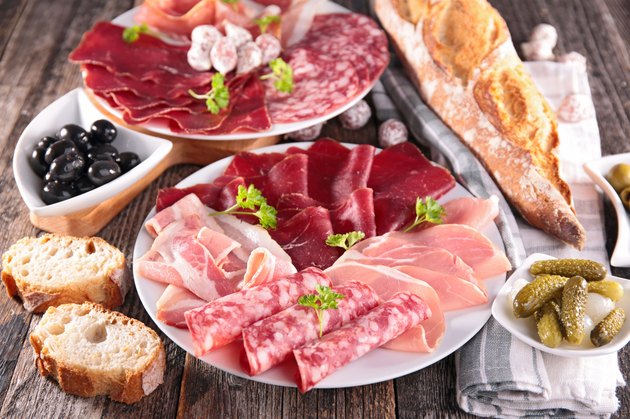 table with meat, bread, olive