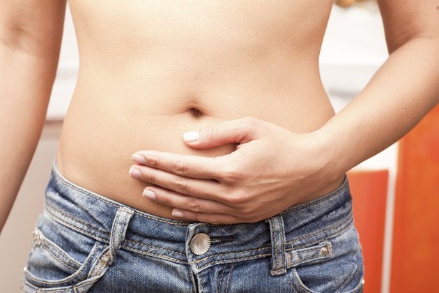 Stomachache, hand on belly