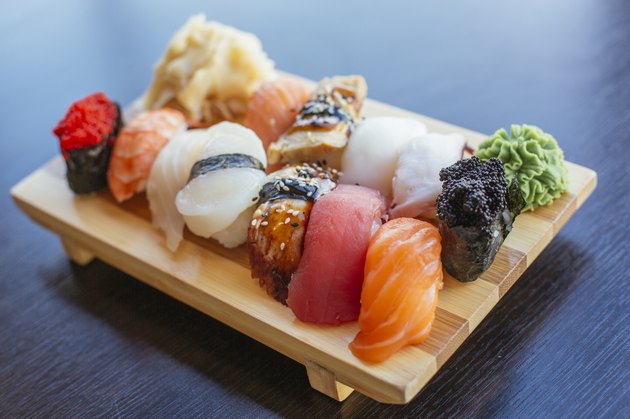Close-up of sushi set on wooden board