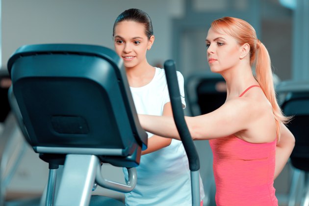 Cute teenage girl and her mom at sports club