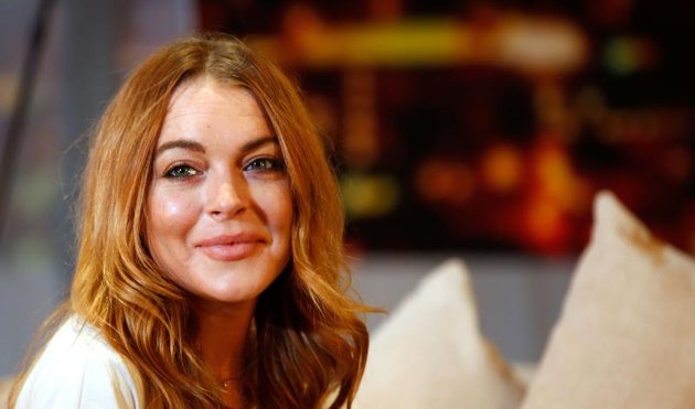 LONDON, ENGLAND - SEPTEMBER 30: Lindsay Lohan performs during a photocall for “Speed The Plow” at Playhouse Theatre on September 30, 2014, in London. (Photo by Tim P. Whitby/Getty Images)