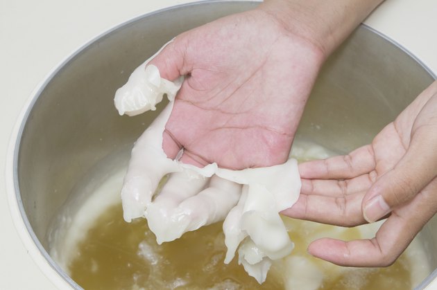 Physical therapy treatment and beauty,Hand in paraffin bath
