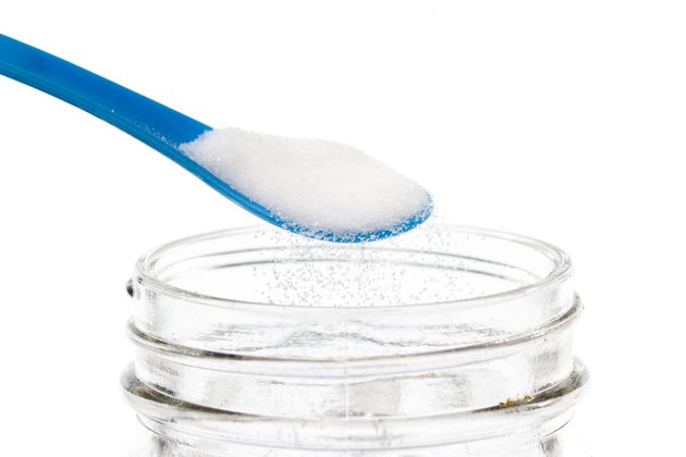 Blue Spoon Pouring Salt