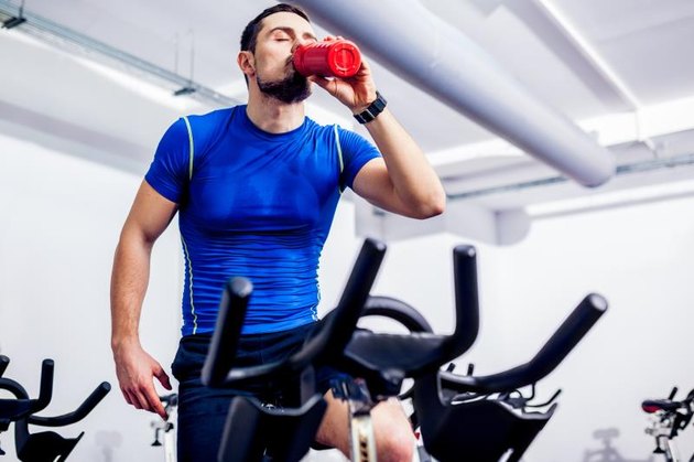 Spinning Instructor at Gym after class drinking water