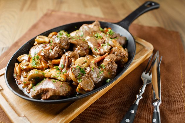 Liver baked with mushrooms, bacon and herbs