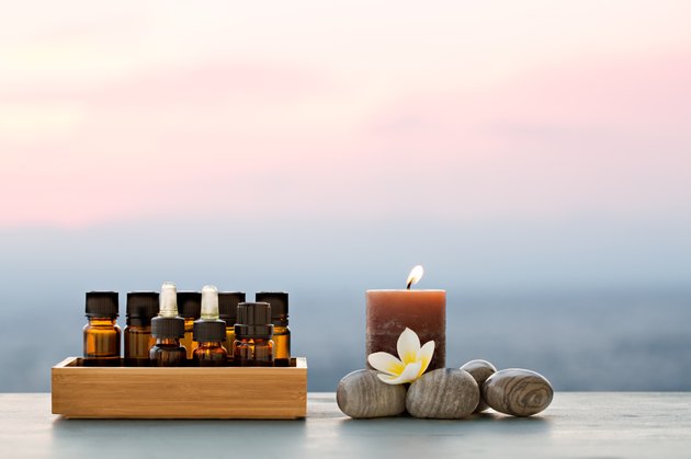 Spa oils in bottles on sunset