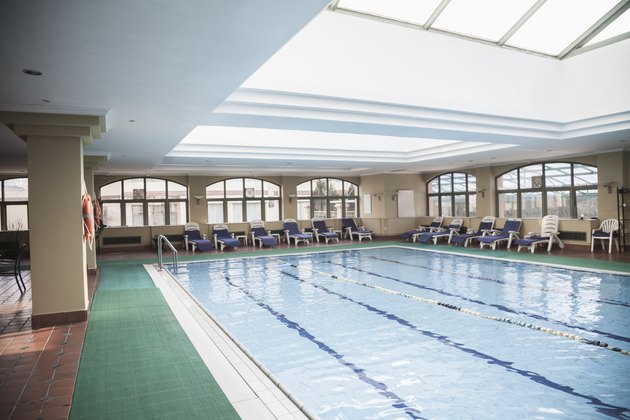 Large, indoor swimming pool with skylight.