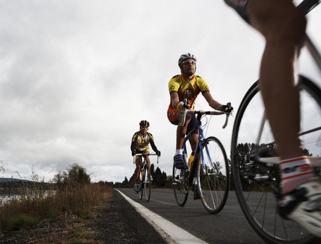 Road cyclists in action, surface level