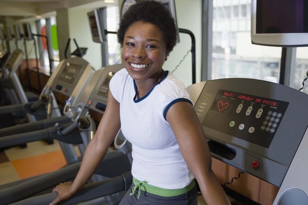 Woman on treadmill in gym