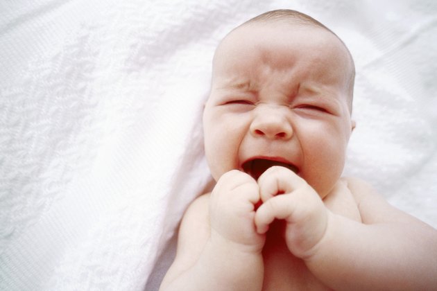 high angle close up of a crying baby