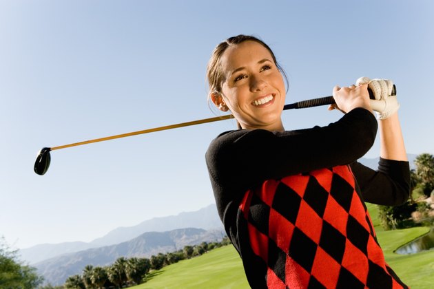 Golfer Watching Ball Drop