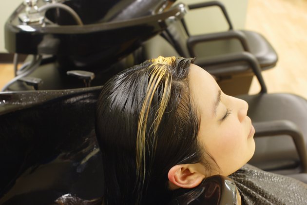Getting hair washed at the hair salon