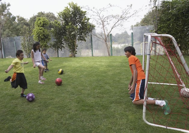 Group of children playing football