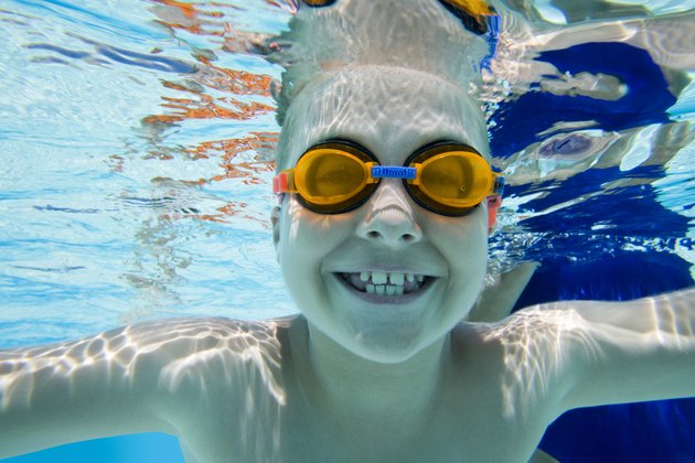 Smiling boy underwater