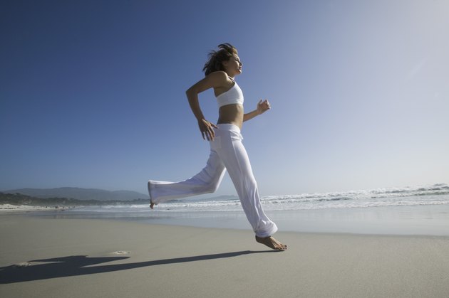 Woman running on beach