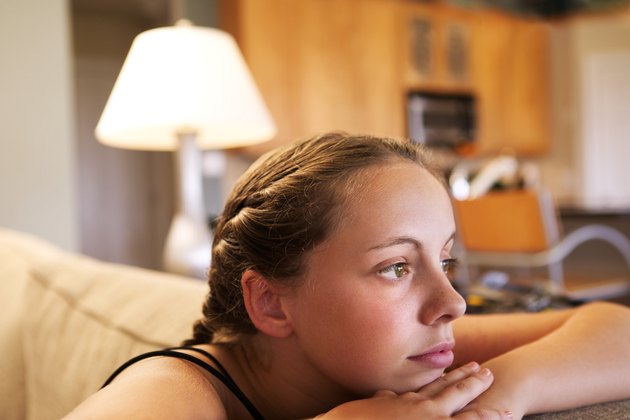 Teenage girl thinking