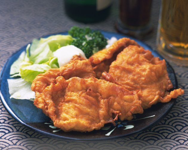 Fried chickens on plate, high angle view, differential focus