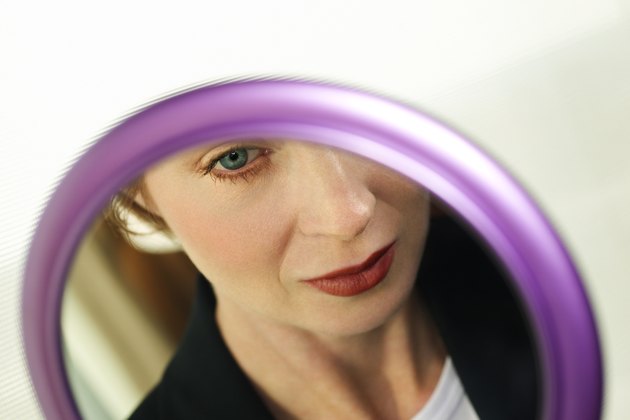 Reflection of woman in mirror