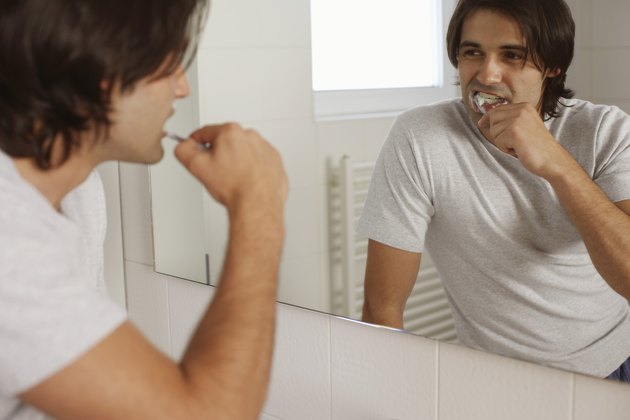 Man brushing teeth