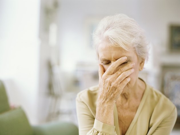close-up of a senior woman with her eyes closed