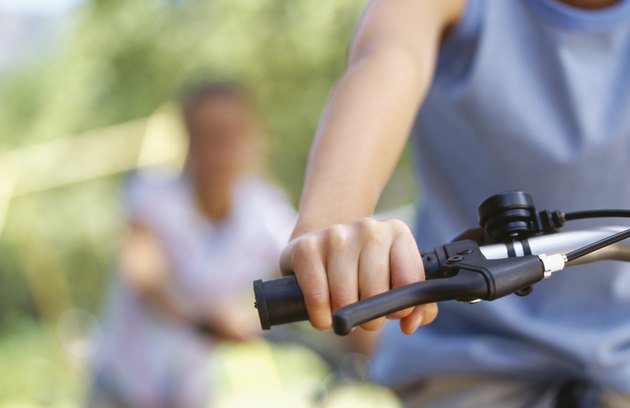 mid section view of a person cycling