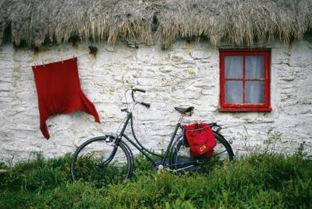 Bicycle outside a cottage, Cregnesh, Isle of Man, British Isles