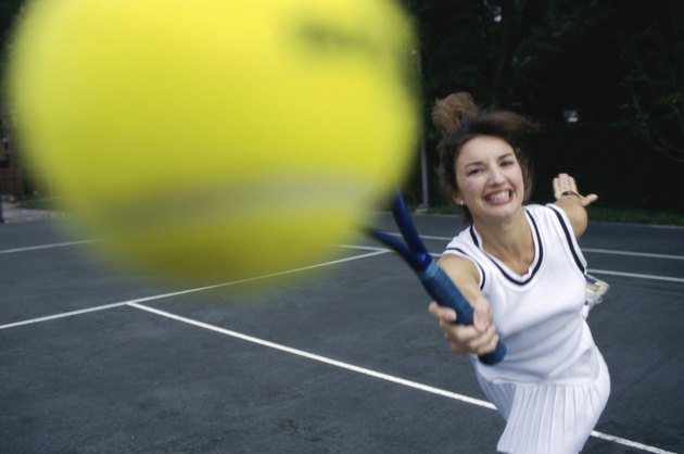 Close-up of a young woman playing tennis