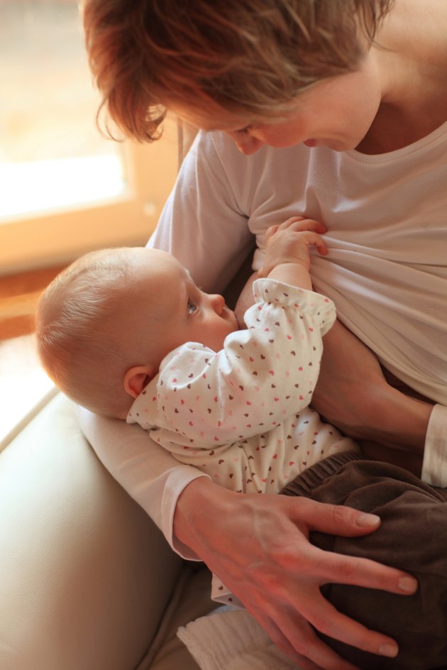 mother breastfeeding baby 5