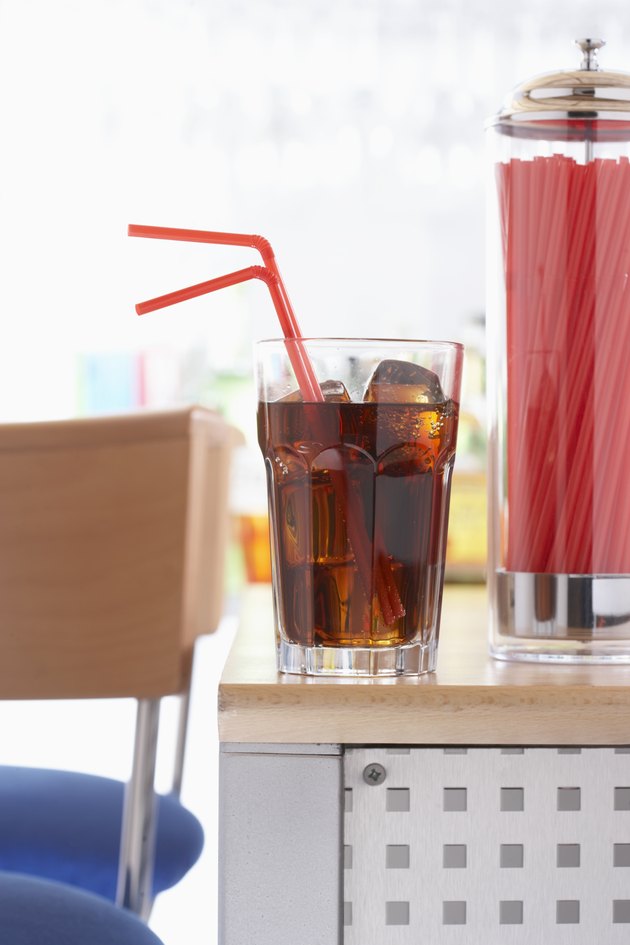 Drink and straw in glass