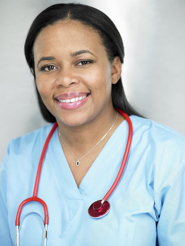 Female doctor smiling, portrait